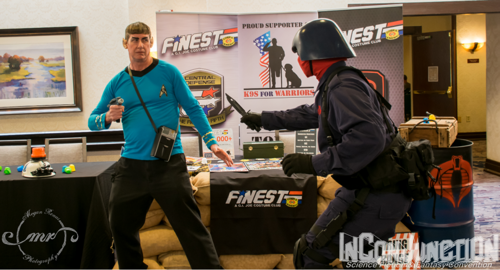 A man dressed as Spock squares off with a person dressed as Cobra Commander from GI Joe